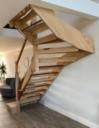 Oak and Resin Staircase from underneath by Cowan Carpentry