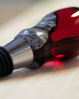 Red Resin Bottle Stopper Close-Up by Branco Works Thumbnail