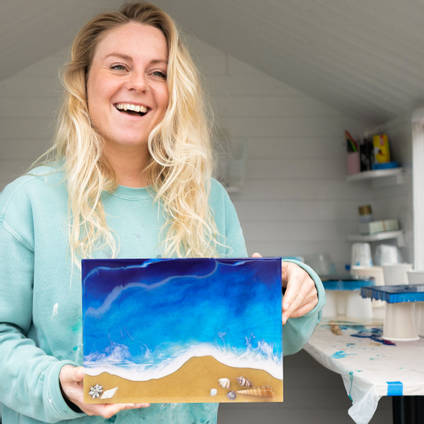Christine with an example of the Beach Scene artwork created with the Making Waves kit
