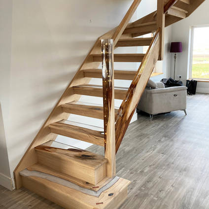 English Oak and Resin Staircase by Cowan Carpentry with Arctic Pearl used in Bottom Step