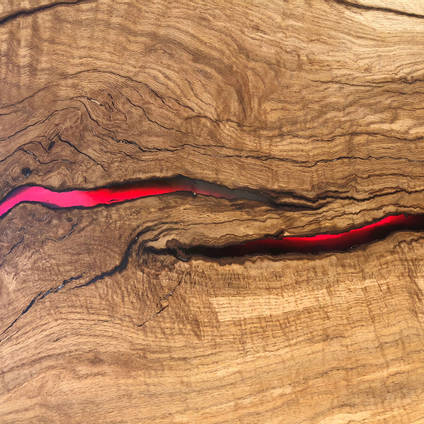 Red Resin Crack Fills in Table by Mindava