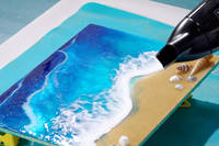 Christine making waves in resin using a hairdryer Thumbnail