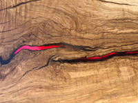 Red Resin Crack Fills in Table by Mindava Thumbnail